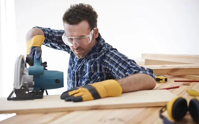 Carpenter Wearing Safety Glasses